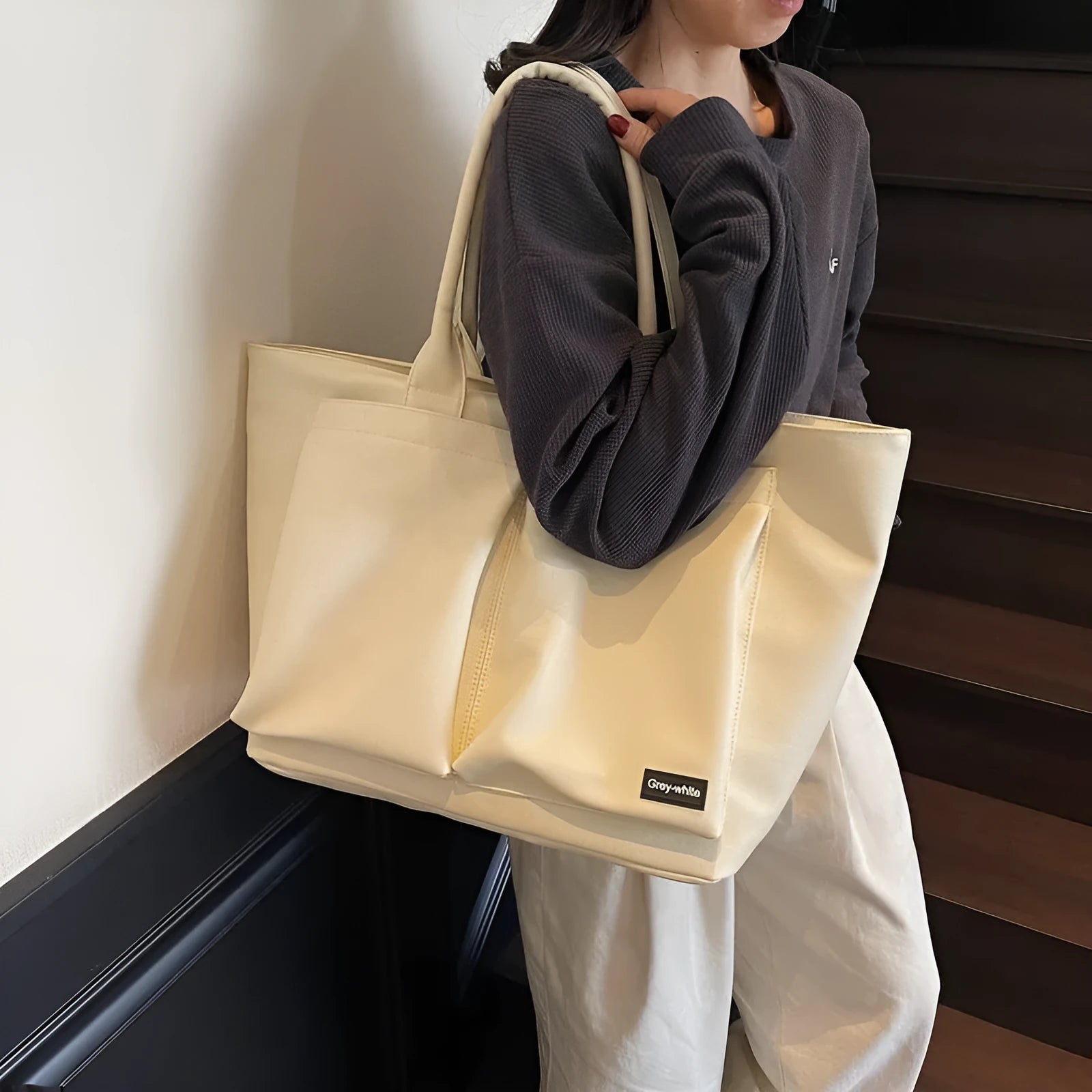 Lightweight PU shoulder bag in solid colour with ventilation, shown in black, green, or white.