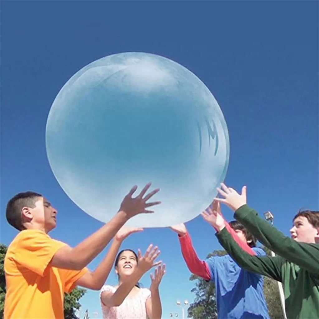 Large pink, yellow, green, and blue inflatable TPR bouncy balls in different sizes.