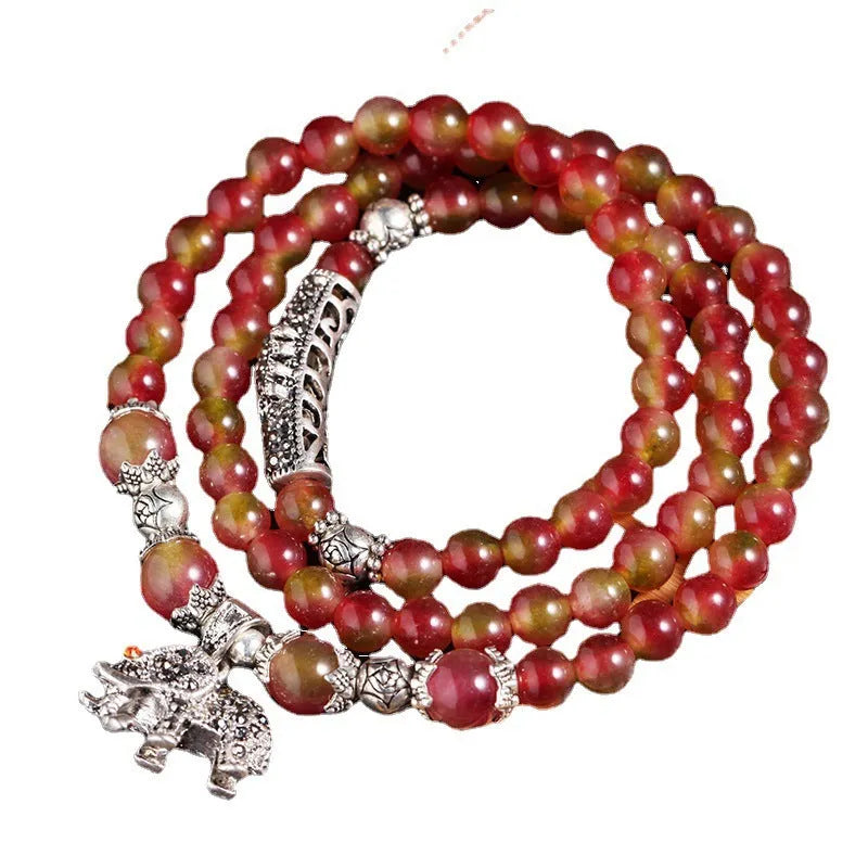 Handmade natural watermelon crystal bracelet with Chinese knot closure in national style.