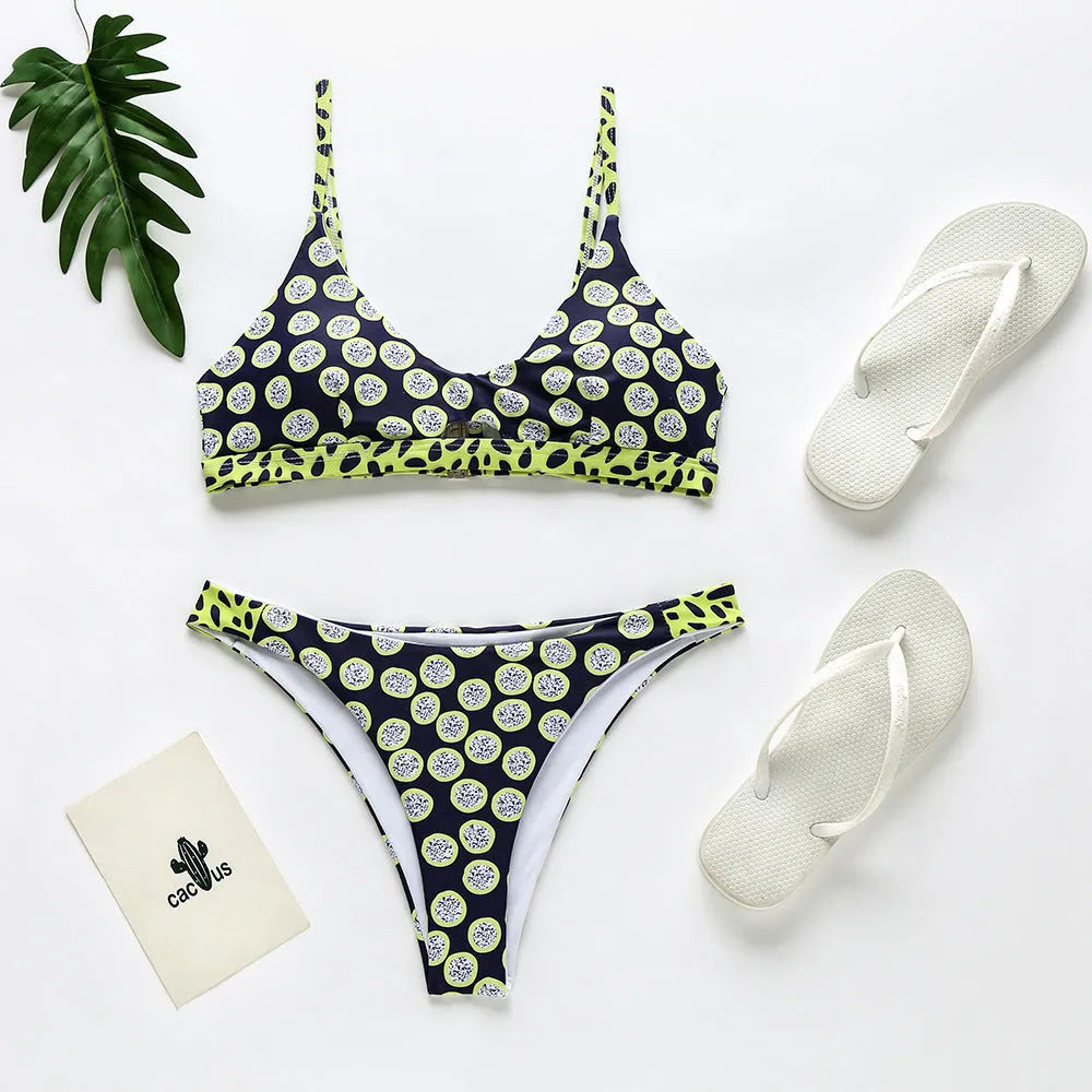 Women's polyester bikini swimsuit in black and white dots or red and white stripes pattern.