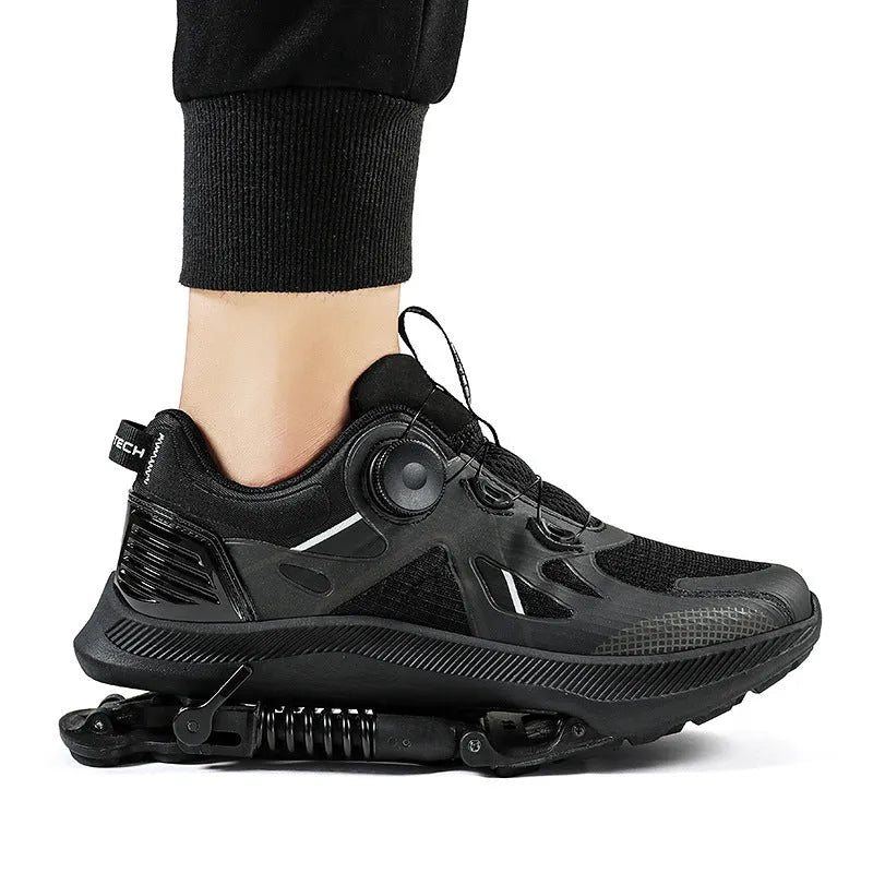 Black running shoes with mesh upper, leather stitching detail, and a buckle closure on the middle top.