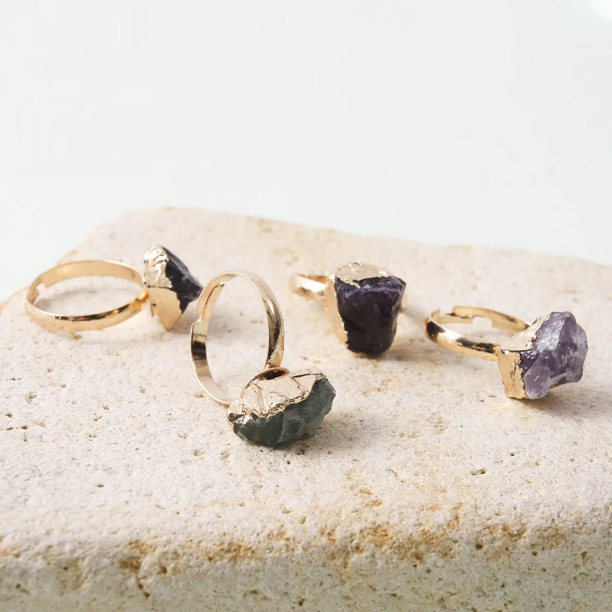 Natural rough stone open ring with gold-plated adjustable band, irregular crystal in amethyst colour