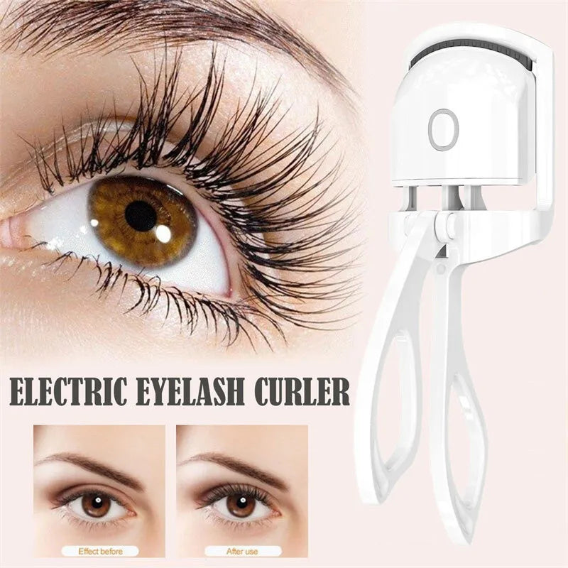 White USB rechargeable heated eyelash curler with dual temperature settings shown on a pink background.