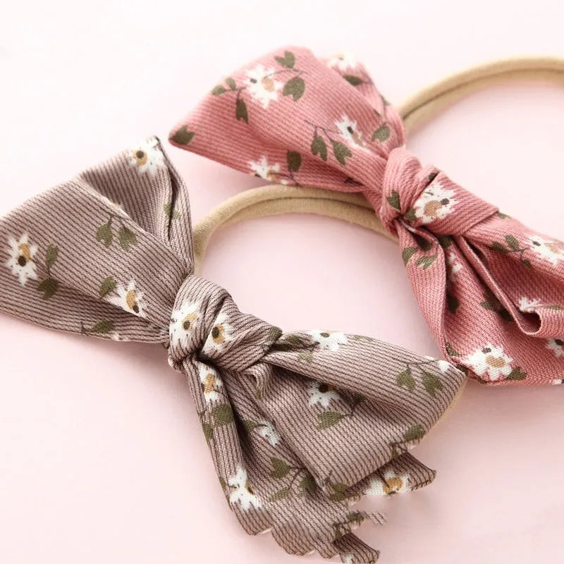 Children's knotted bow hair ring made of cloth in a Princess series Snow White design.