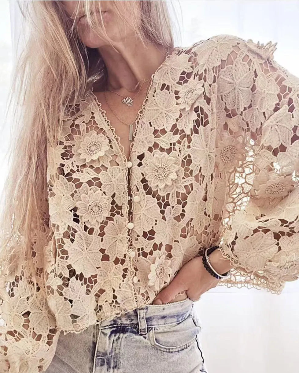 Women's loose-fitting lace cardigan with 3D floral decoration and V-neck in black.