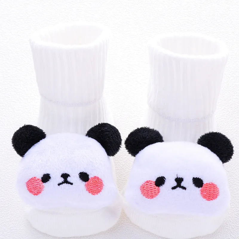 Cotton baby socks with non-slip soles in multiple designs including bows, stars, and animal prints.