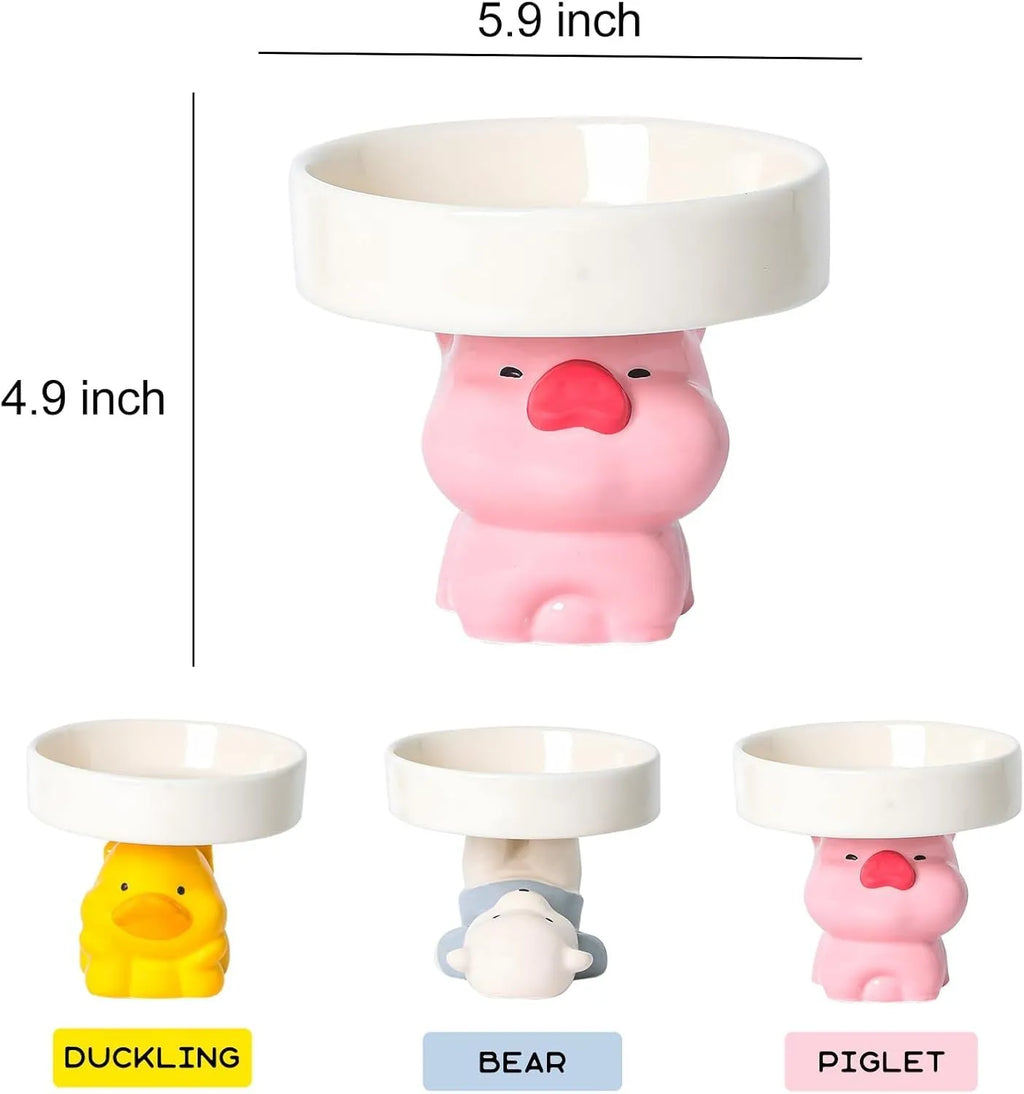 Raised ceramic cat bowl with animal design on 12.5cm elevated base