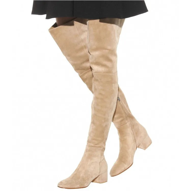 Grey women's suede over-the-knee boots with a flat thick heel and pointed toe.