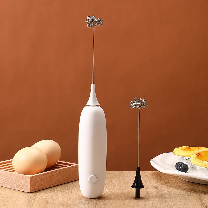 Electric hand-held milk frother in modern simplicity design for coffee preparation