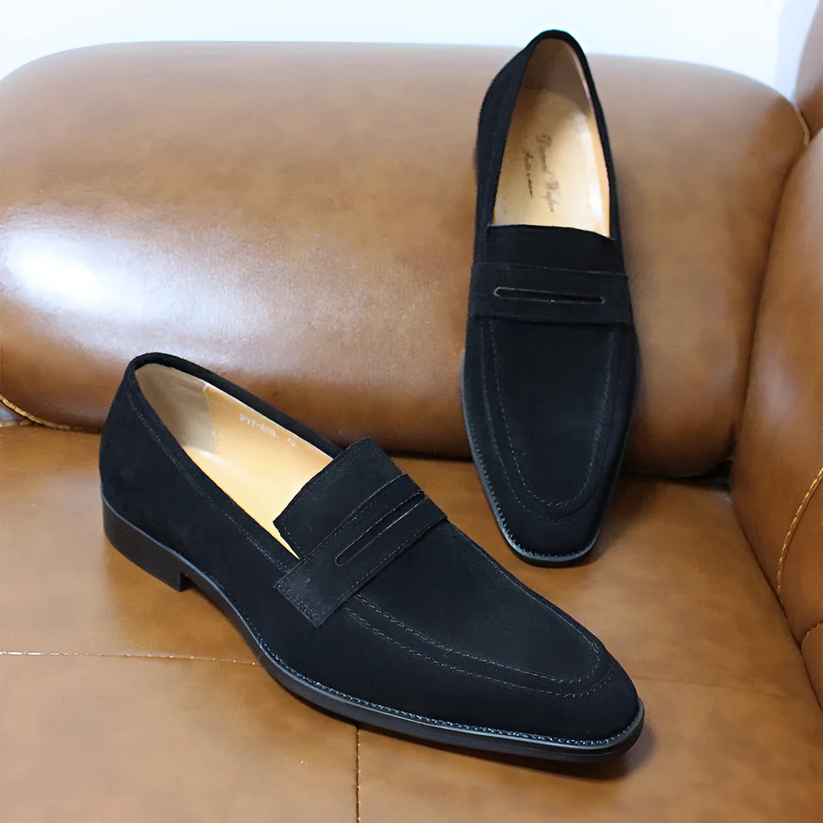 Men's cowhide leather lazy breathable slip-on casual shoes in black and brown with rubber sole