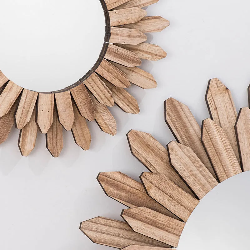 European style solid wood round hanging mirror in baked colour finish on a wall.