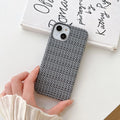 Hand-woven plaid TPU mobile phone case in pink with all-inclusive fit and fall protection