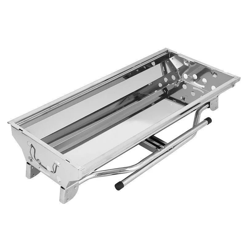 Stainless steel portable folding barbecue oven with large grill area.