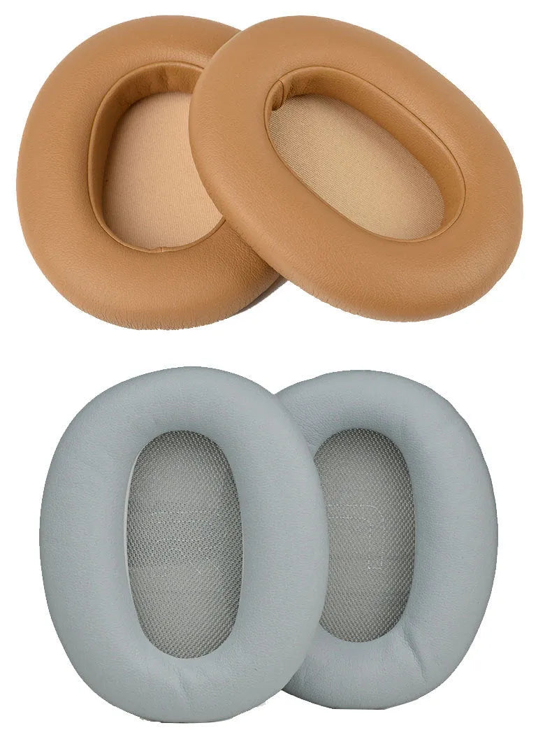Black protein skin oval earphone sleeves for Walker W820BT headphones on a surface