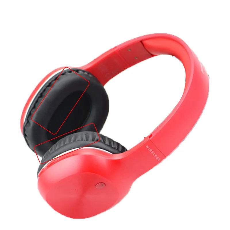 Black protein skin oval earphone sleeves for Walker W820BT headphones on a surface