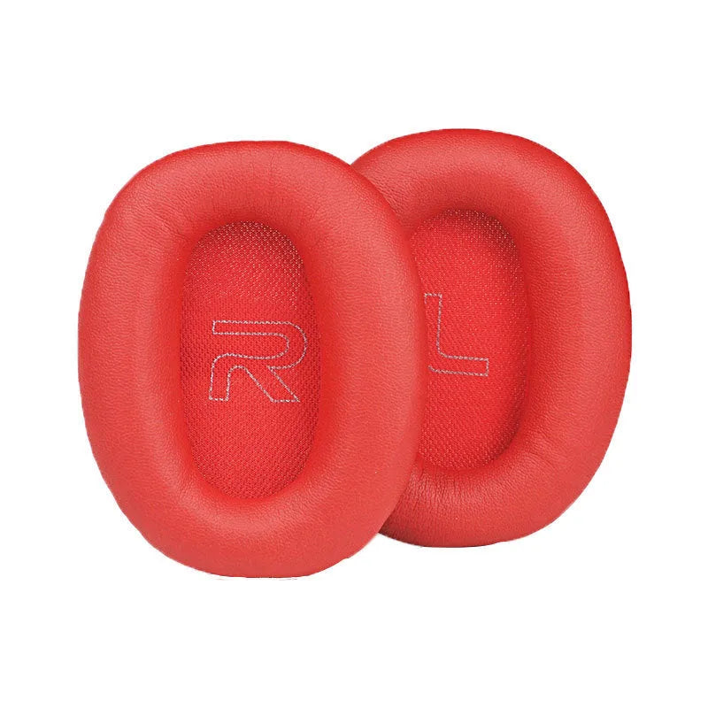 Black protein skin oval earphone sleeves for Walker W820BT headphones on a surface