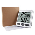 Silver electronic digital thermometer with humidity display for wall mounting in living room or baby room
