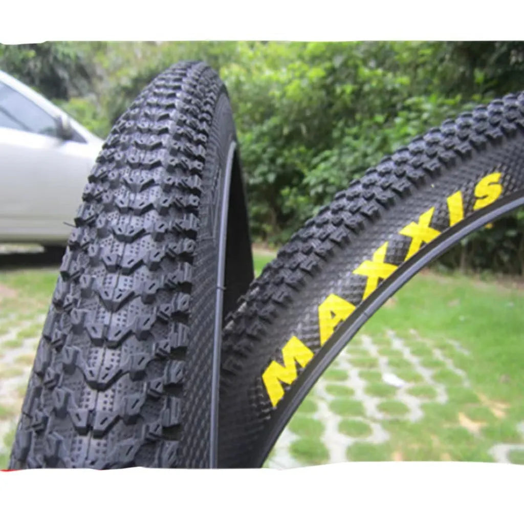 Mountain bike ultralight puncture-proof tyre shown in multiple sizes for 26, 27.5, and 29-inch wheels.