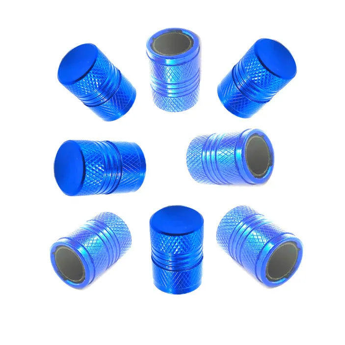 Aluminium car tyre valve cover in black, 17mm length, on a tyre valve stem