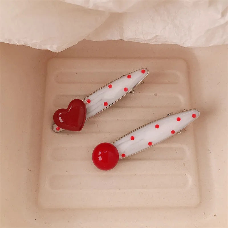 Red three-dimensional love heart hair clip with French dots and willow leaf decoration