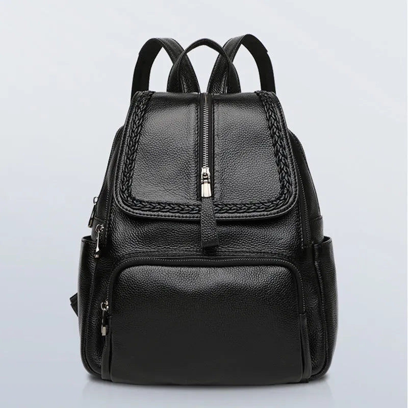 Solid colour genuine leather women's backpack with front sandwich pocket in blue.