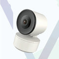 Indoor smart WiFi security camera with pan-tilt mechanism showing measurement scale