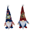 Two faceless red and white Rudolf suit baby doll Christmas tree ornaments made of cloth.