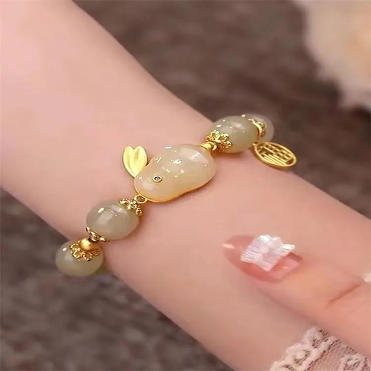 Green jade hare bracelet for women with Chinese style zodiac animal design and lily decorations