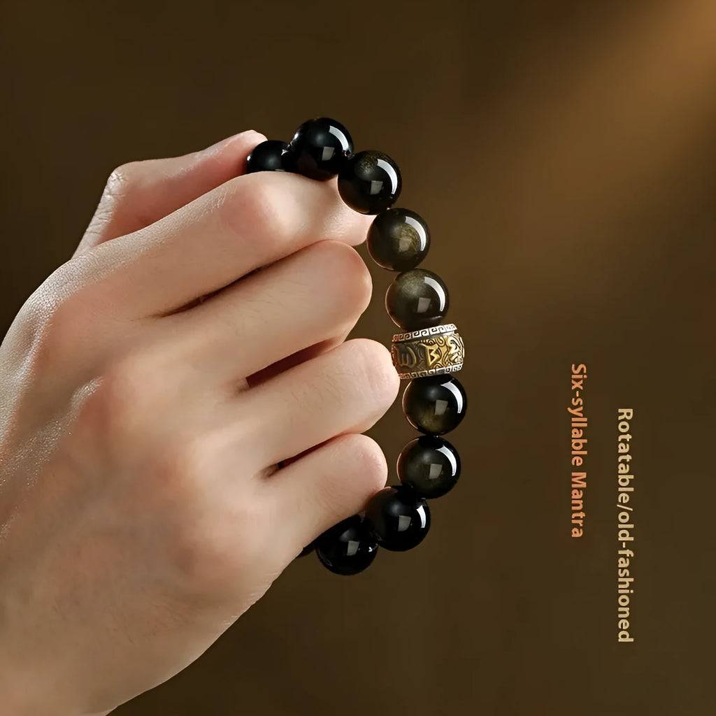 Hand-carved natural cinnabar bead bracelet with Jinniu animal design in gold or silver obsidian.