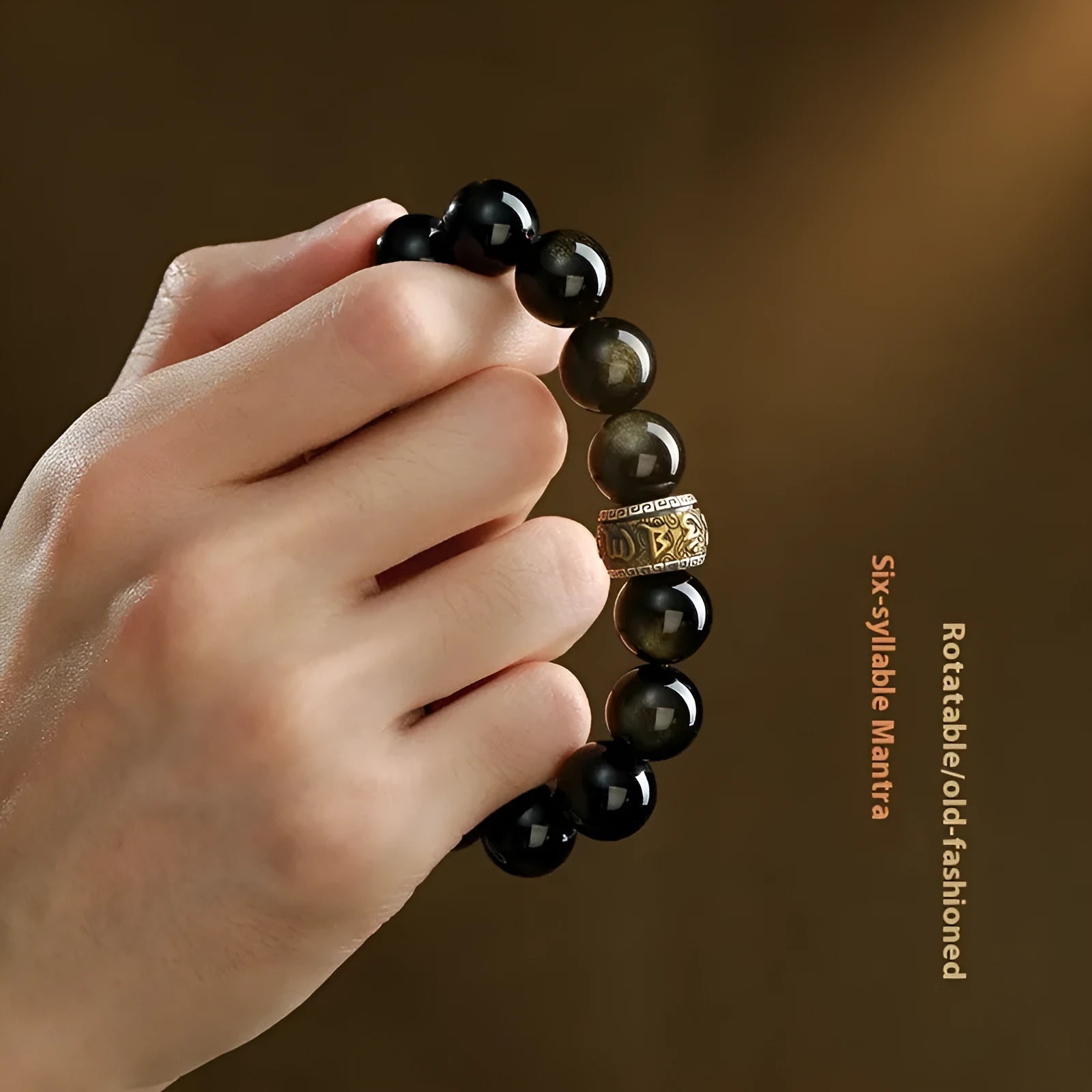 Hand-carved natural cinnabar bead bracelet with Jinniu animal design in gold or silver obsidian.