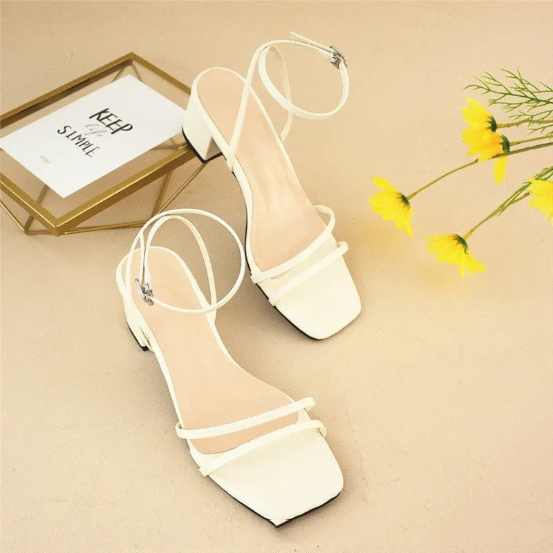 Beige women's square toe sandals with chunky stiletto heel and ankle buckle strap
