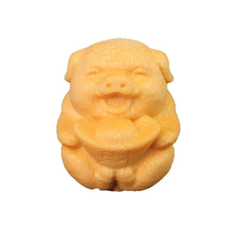 Solid bamboo carving ornament of cute pig figure measuring 4cm tall by 3.5cm diameter