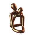 Modern simple style resin couple statue in milky white or gold finish for bookshelf decor