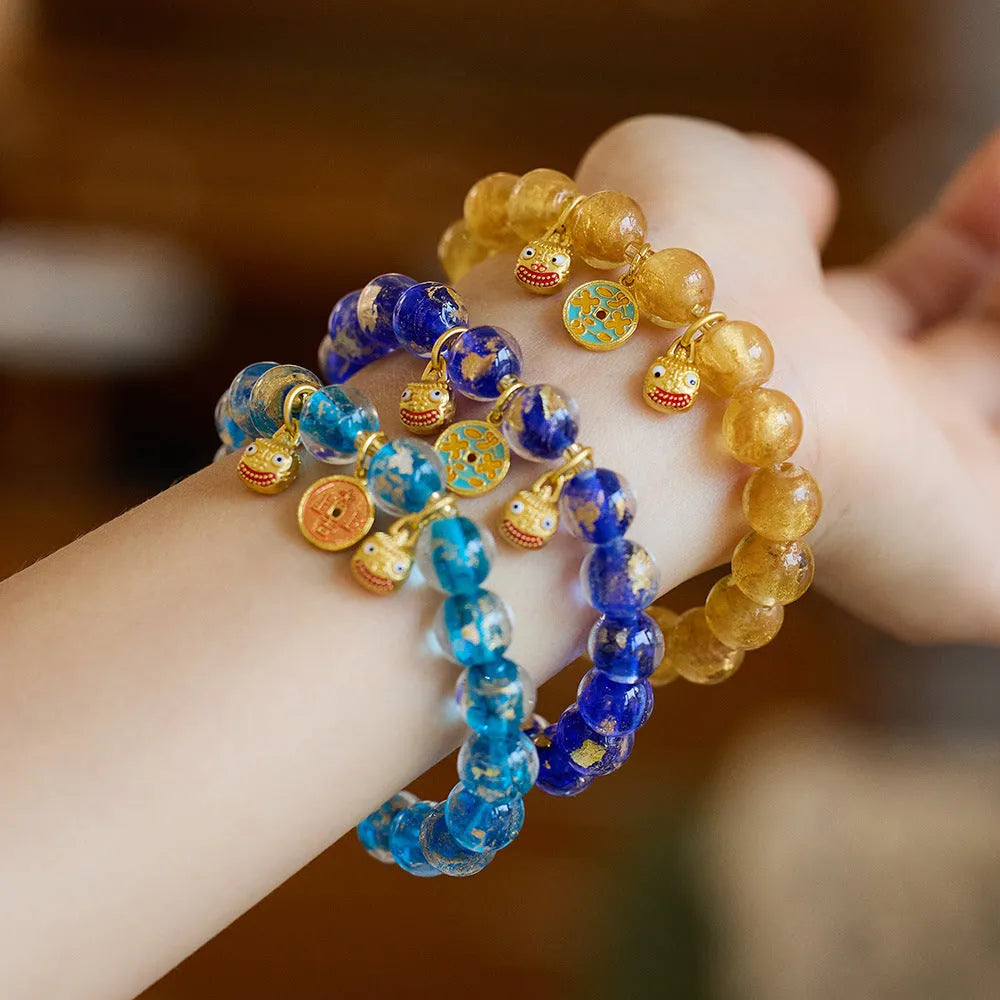 Handmade national style bracelet with geometric swallowing gold beast design in fragrant gray gold foil coloured glaze