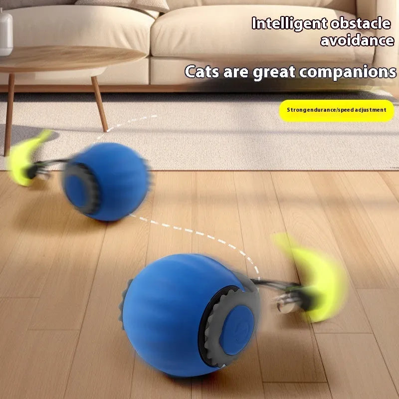 Orange and blue silicone gravity-powered cat toy with rolling ball and gun grip attachment options