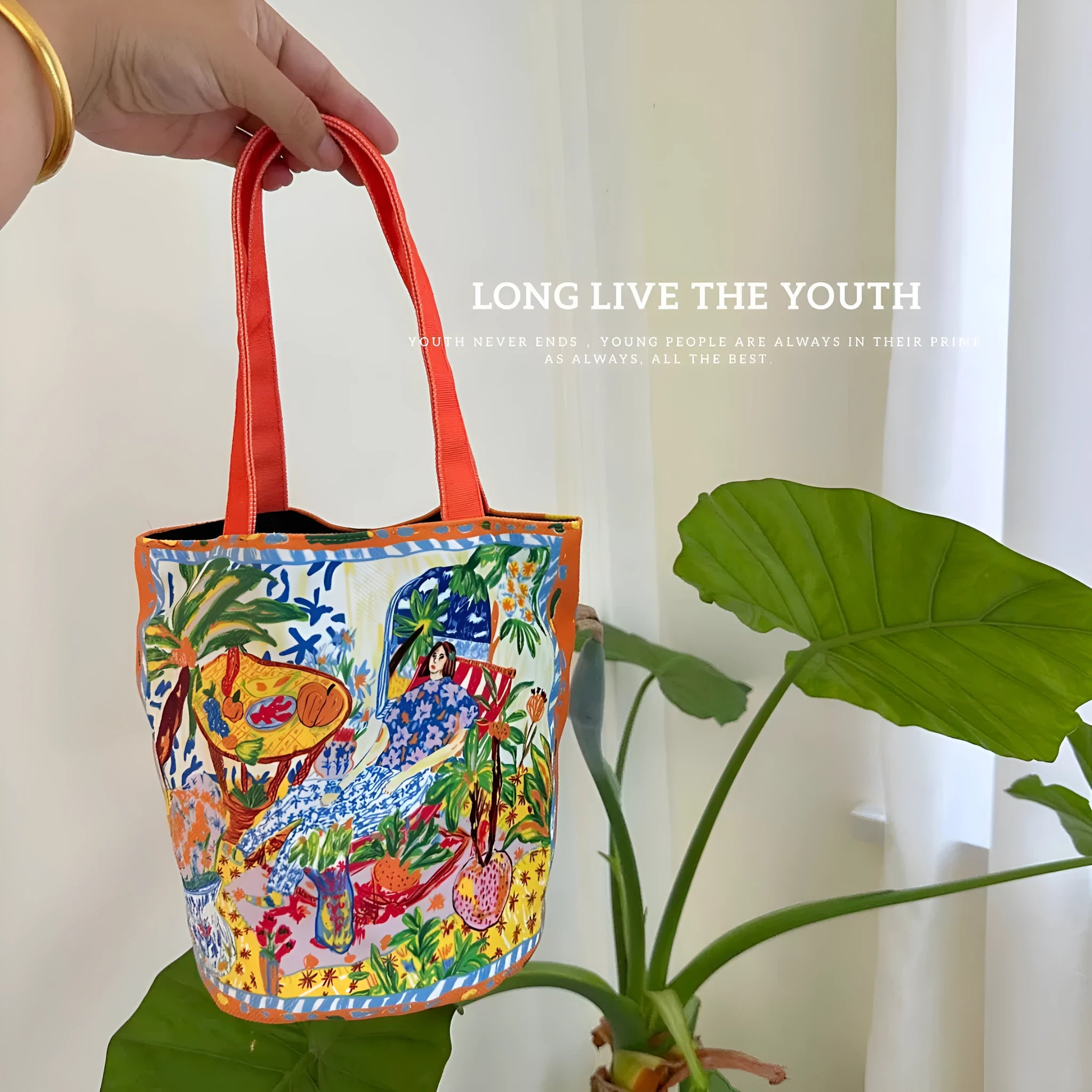 Dream Garden Orange canvas bucket bag with plush finish and double shoulder straps
