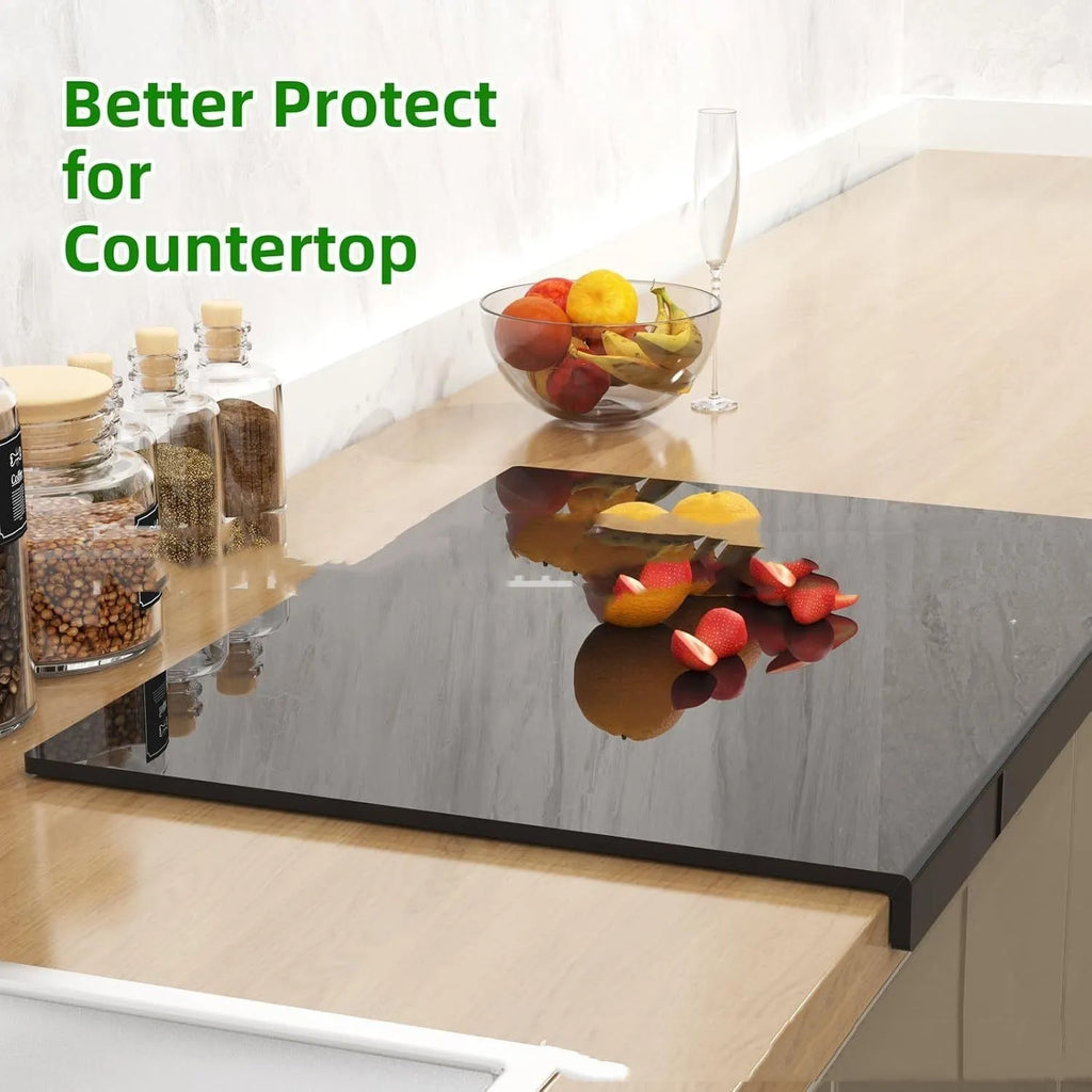 Black transparent acrylic chopping board in 30 x 20 cm size on a kitchen counter