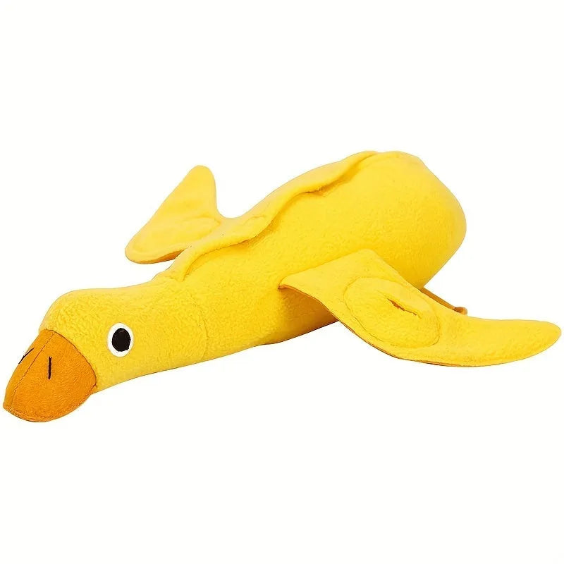 Yellow teddy duck dog toy with food leak openings for treat dispensing during training and play