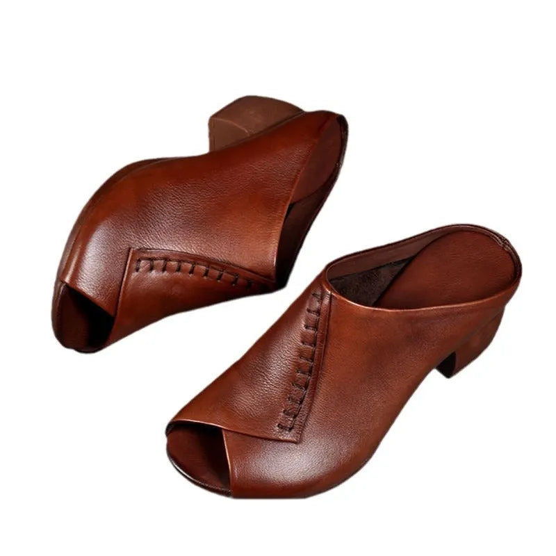 Women's black square heel peep-toe slippers with a fish mouth vamp design on a white background.