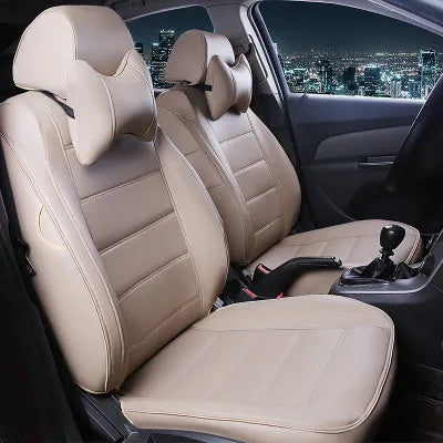 Cow leather car seat cover in beige and black with red accent colour options on a car seat.