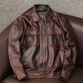 A loose-fit men's black PU leather lapel jacket with a side pocket, shown on a model.