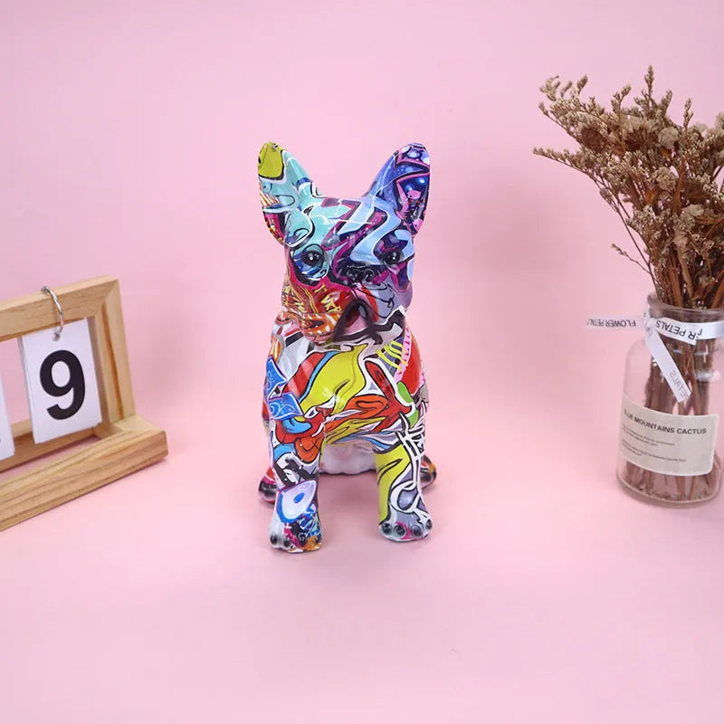 Modern graffiti-colour French bulldog resin statue on a shelf.