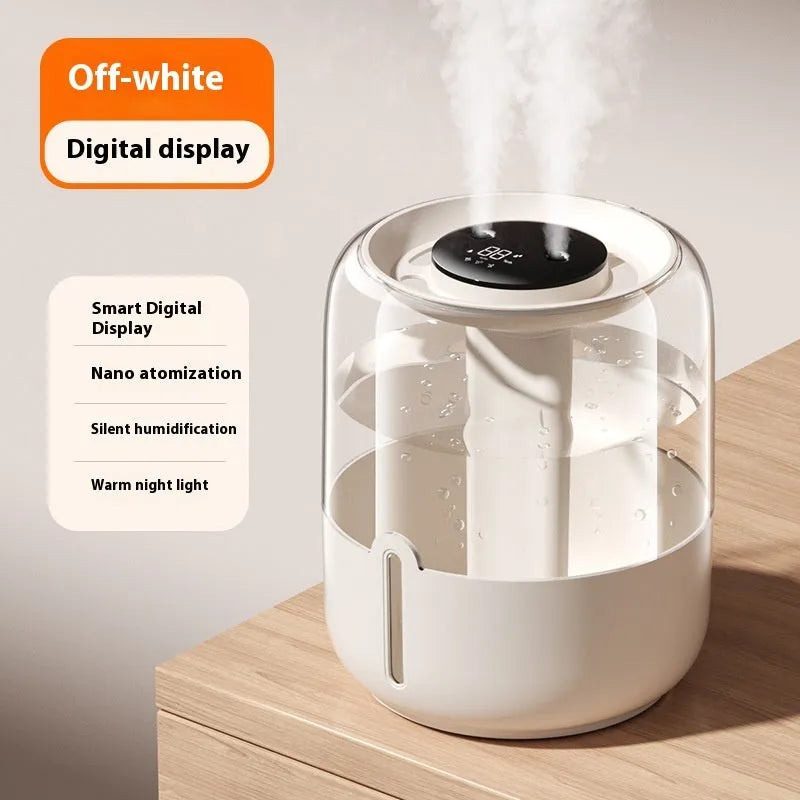 Beige round USB-powered humidifier with dual spray nozzles, display, and night light on a surface.