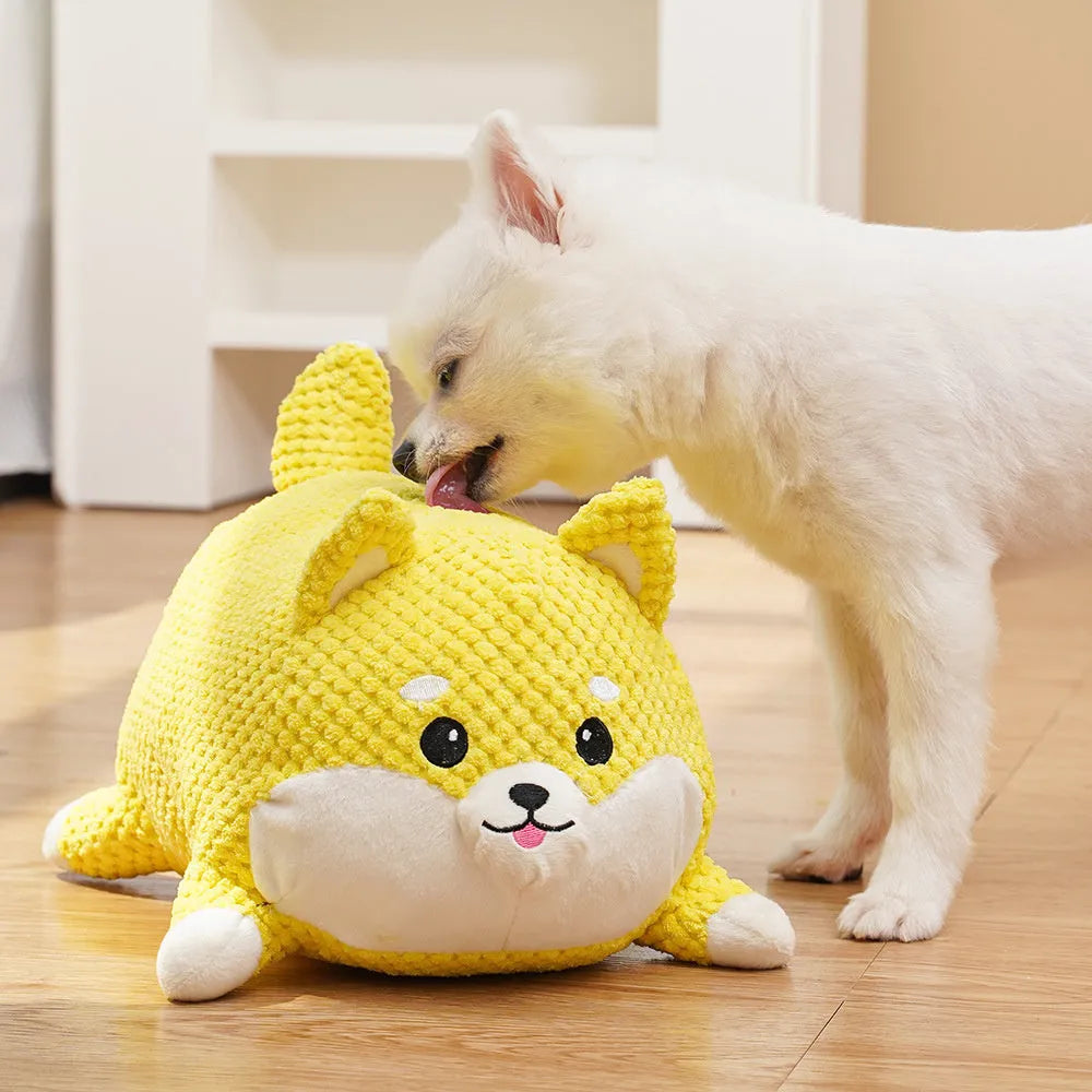 Plush calming dog toy with squeaker for chewing and anxiety relief, shown in large and medium sizes.