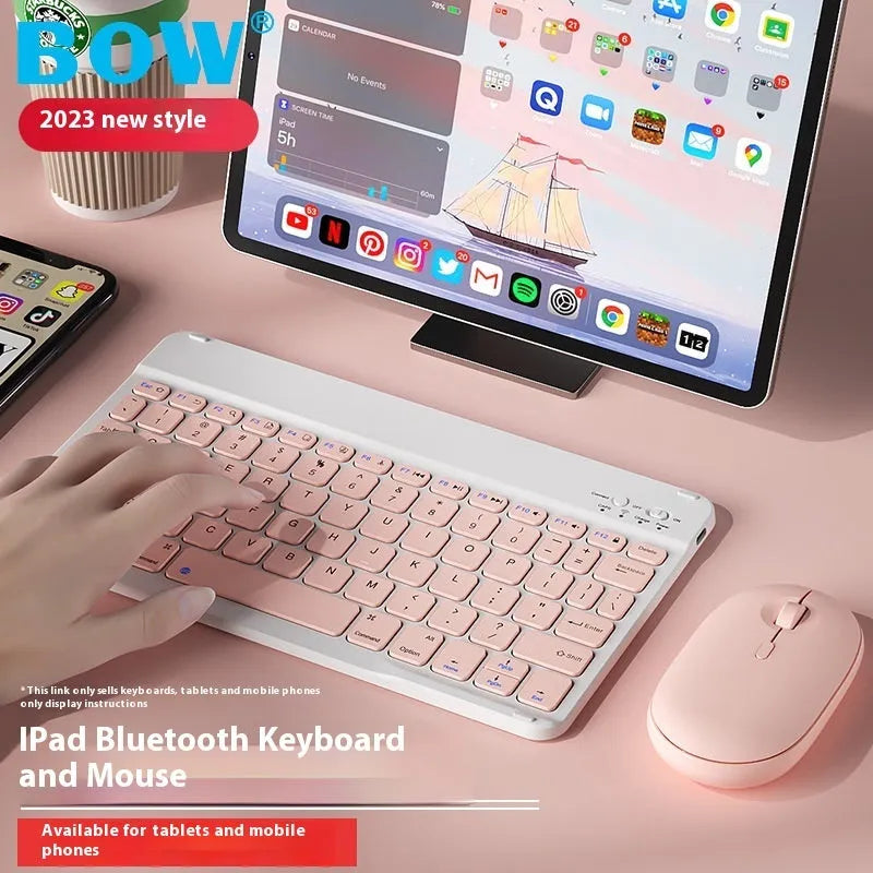 Bluetooth keyboard and rechargeable mouse set for tablet in elegant white on a desk