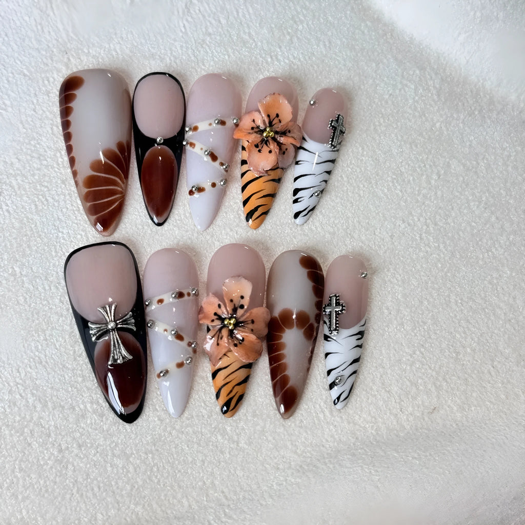 Handmade leopard print, cross and flower pattern acrylic nail stickers in XS, S, M, L sizes.
