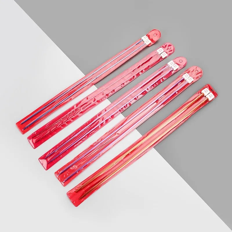 Lengthened crochet hook set showing 14 different sizes from 2.0mm to 10.0mm with protective end caps