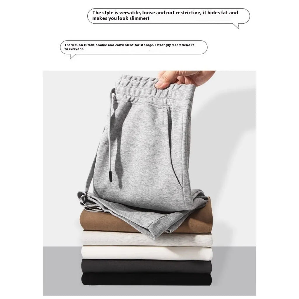 Men's straight-leg cotton summer shorts in light grey, shown on a hanger.
