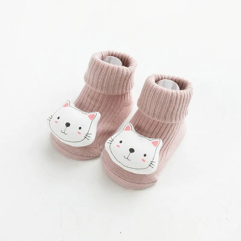Children's combed cotton non-slip socks in multiple colours for sizes XS, S, and M.
