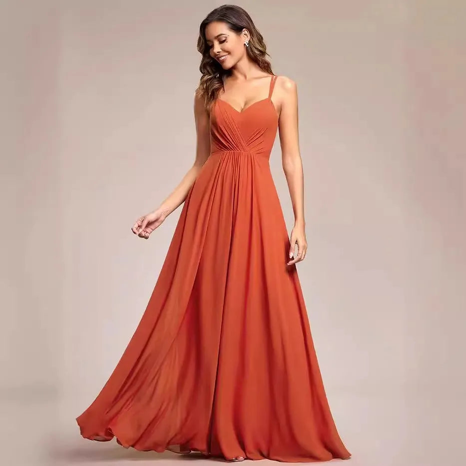 Women's sleeveless sling neck pleated dress in light green with A-line skirt for banquet events